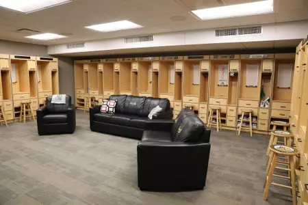 Locker room with stools and couches