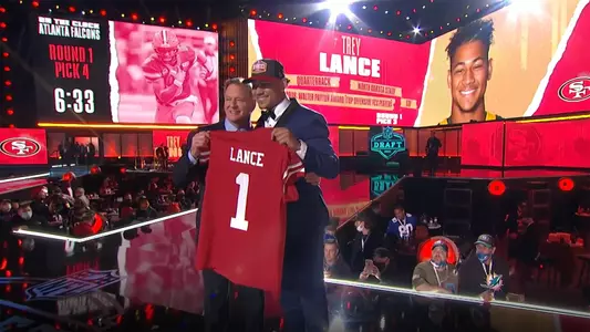 Trey Lance with Roger Goodell on the NFL Draft stage