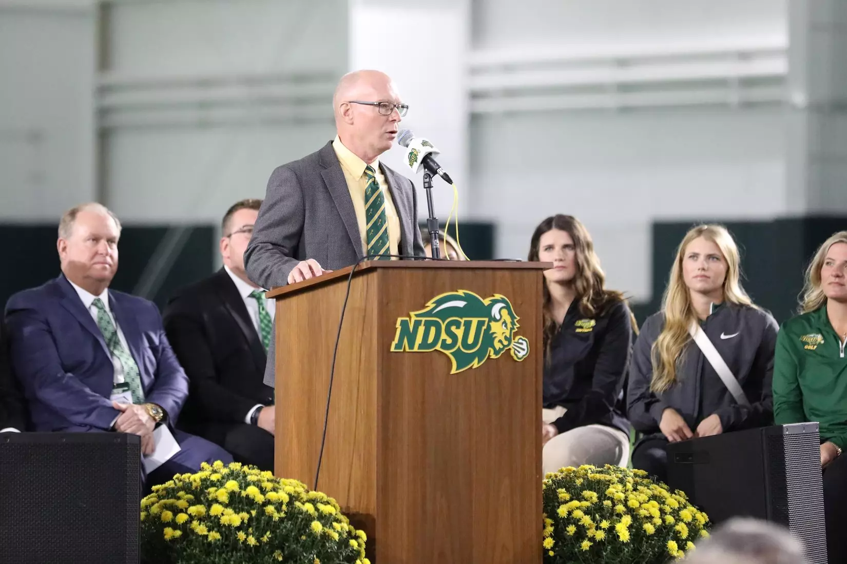 NDSU senior associate athletic director Jack Maughan speaks at the ribbon cutting ceremony for the<br>Nodak Insurance Football Performance Complex.