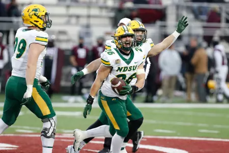 James Kaczor and Logan Kopp celebrate an onside kick recovery