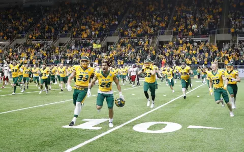 NDSU football team members celebrate the win over Incarnate Word