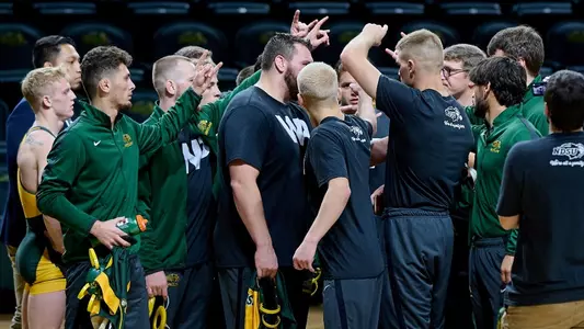 Wrestling Group Huddle