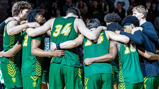 NDSU men's basketball team huddle