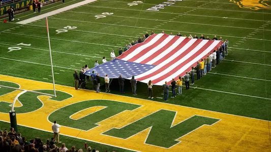 U.S. flag on football field