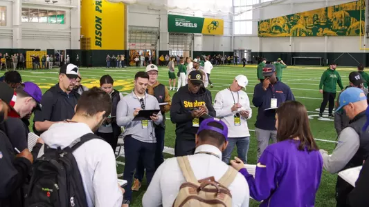 Football scouts at 2025 NDSU Pro Day