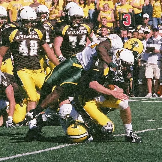 Joe Lardinois and Ramon Humber sack at Wyoming