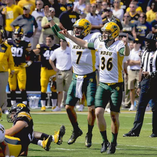 Cam Pedersen and Cole Davis celebrate NDSU's winning field goal at Iowa