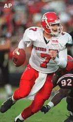 Billy Volek connected with<br>Rodney Wright for the<br>first score of the game,<br>a 25-yard pass a minute into the game.