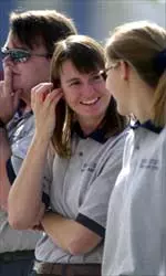 Head swimming coach Daniella Irle (center) and her coaching staff will be present at Fresno State's National Girls & Women in Sports Day on-campus festivities on Feb. 6.