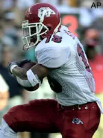 Charles Smith catches a pass in the second quarter Friday against Hawaii.
