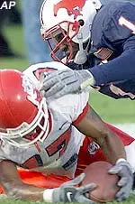 Fresno State's Rodney Wright falls into the end zone for a TD while defended by SMU'a Kevin Garrett in the fourth quarter.