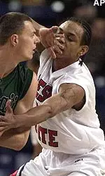 Fresno State guard Tito Maddox, right, tries to stop Hawaii's Nerijus Puida from advancing the ball during the first half of the semifinals of the Western Athletic Conference men's basketball tournament in Tulsa, Okla., Friday.