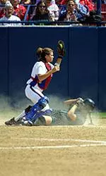 Junior catcher Pam West prevented a Husky run from scoring in the bottom of the second and had a RBI single in the sixth in the Bulldogs 2-0 victory over sixth-ranked Washington.
