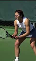 Chloe Carlotti became an All-American when she won both of her matches Tuesday and advanced to the Round of 16 at the NCAA Singles Tournament.
