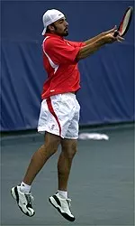 Hector Almada won in singles and doubles on Saturday at the Polo Tennis National Collegiate Tournament in Tulsa, Okla.