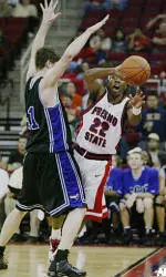 Dominique White passes around Grand Canyon's Kevin Stevenson.