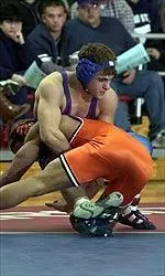 Senior Jim Medeiros won a major decision to pace the Bulldogs to an early lead.