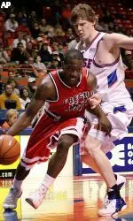 Guard Ja'Vance Coleman drives past Boise State's Coby Kar during the first half. (AP Photo/Matt Cilley)