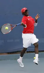 Junior Charles Irie won both of his matches in dominating fashion Sunday at the Wathen Tennis Center.
