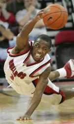 Fresno State's Kevin Bell makes a leaping pass after stealing the ball in the final seconds of the first half. Bell would go on to score six points to go along with five assists and two steals in the Bulldogs' conference win over the Rainbow Warriors (AP Photo/The Fresno Bee, Kurt Hegre).