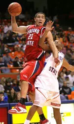 Hector Hernandez grabs a rebound over Boise State's McNeal Thompson (1) during the first half. Hernandez finished with 12 points and six rebounds as he posted his seventh double figure scoring game of the season (AP Photo/Matt Cilley).