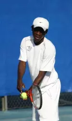 Senior Charles Irie won in both singles and doubles, Sunday at the Wathen Tennis Center.
