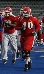 Nate Adams runs off the field at Bronco Stadium on Dec. 29 for his final