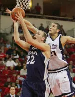 Hector Hernandez tries to block Nick Fazekas in Fresno State's WAC matchup with Nevada. (AP Photo/Gary Kazanjian)