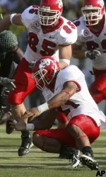 Fresno State running back Ryan Mathews (21) tries to recover a fumble in the first quarter. (AP Photo/Rick Bowmer)