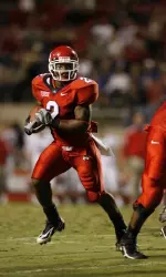 Clifton Smith rushes around the outside Saturday night against Louisiana Tech.