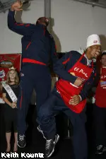 Chris Carter and Nico Herron celebrate the team's win in the Great Green Chile Bowl contest.