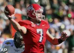 Tom Brandstater passes the ball vs. Colorado State. (AP Photo/Ross D. Franklin)