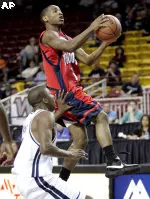 Kevin Bell drives against Nevada.