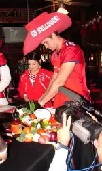 Ryan Colburn begins preparing the chili.