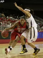 LaShay Fears drives against Cal's Natasha Vital (AP Photo/Francis Specker)