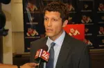 Brian Zwaschka talks to a reporter from KSEE 24 at his press conference on Tuesday.