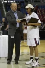 Jaleesa Ross accepts her WAC Tournament honors at the 2009 WAC Tournament from WAC Commissioner Karl Benson.