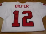 An autographed Trent Dilfer throwback jersey is up for bid.