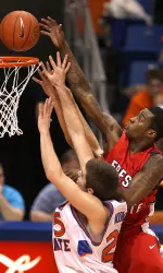 Mychal Ladd (1) tries to make an offensive rebound against the reach of Boise State's Paul Noonan (25) during the first half.