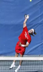 In singles, de Villiers earned a bye the round of 128 and advances to the Round of 64.