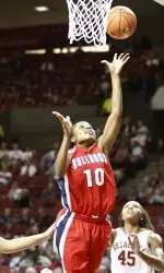 Fresno State forward Marnique Arnold drives to the basket during the first half.