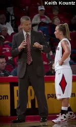Fresno State coach Adrian Wiggins offers some tips to freshman guard Alex Furr.