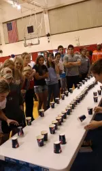 A majority of the athletes competed in the water flip cup competition.