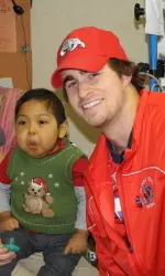 Zak Hill poses for a photo Friday afternoon with a patient at St. Luke's Hospital in Boise, Idaho.