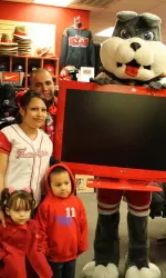 Vanessa Garcia and her excited family with their brand new Fresno State TV.