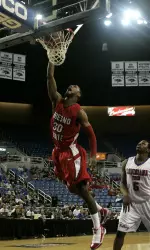 Fresno State's Sylvester Seay slams down a dunk after Brandon Sperling intercepted a LA Tech inbounds pass.