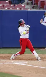 Lisamarie Coronado had the first hit of the game for the 'Dogs.