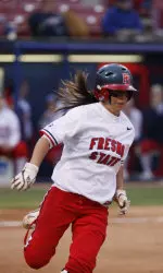 Andrea Ortega scored the winning run.