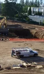 The initial hole for the pool has been dug.