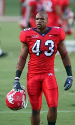 Carter prepares for a game day with his iPod playlists and quotes.